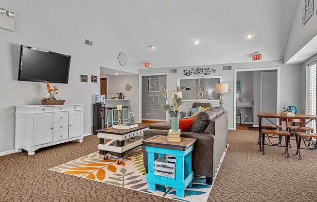 a living room with a couch and a television