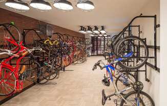 a room filled with lots of bikes on a wall