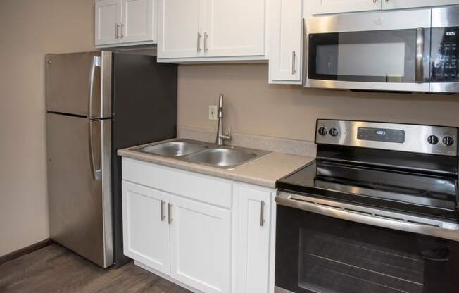 Studio apartment, kitchen with stainless steel appliances