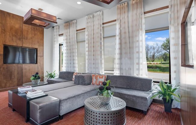 a living room with a couch and a table