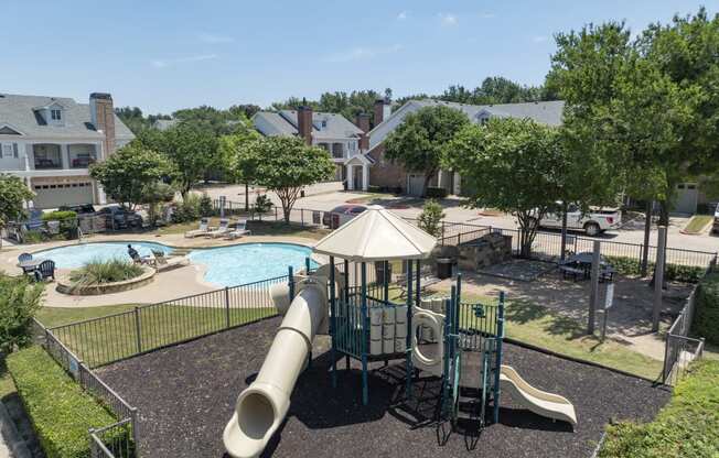 Outdoor playground overlooking the pool