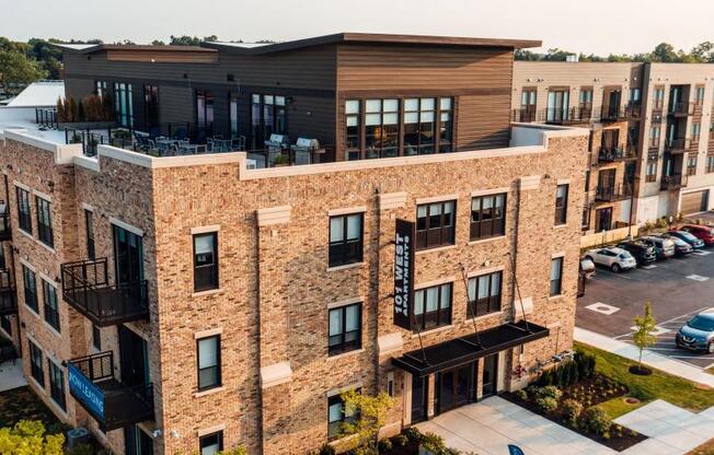 an aerial view of a building with cars parked in a parking lot at Barrington 101, Barrington, IL 60010