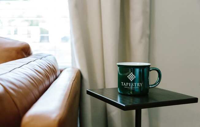 tapestry coffee cup in living room