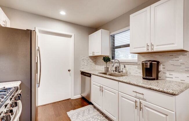 RECENTLY REMODELED 3 BR / 2 BATH COTTAGE LOCATED STEPS FROM THE PRESTIGIOUS OLMOS PARK