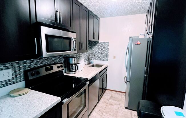 Charming 1 Bedroom 1 Bath-Fully Furnished Just feet away from the Sandy Beach