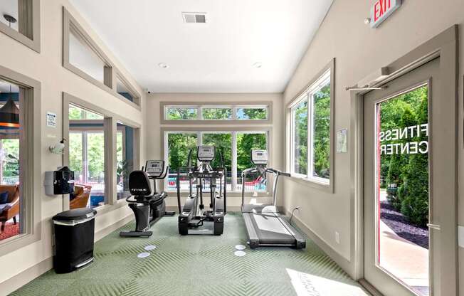 Retreat at Indian Lake Apartments Hendersonville TN gym with treadmills, elliptical machines and other exercise equipment.