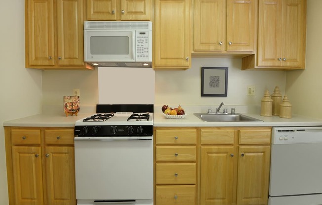 Kitchen with plenty of food storage at Rockdale Gardens Apartments*, Baltimore, MD