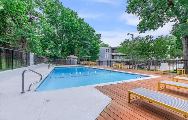 a pool next to a fence