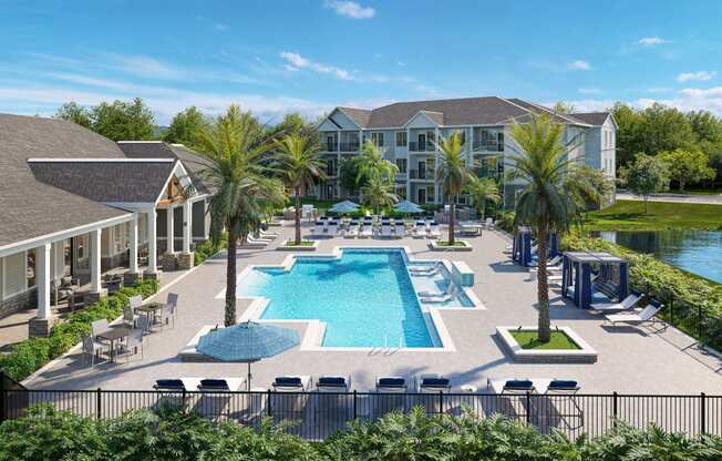 an aerial view of an outdoor pool with chairs and umbrellas at the resort