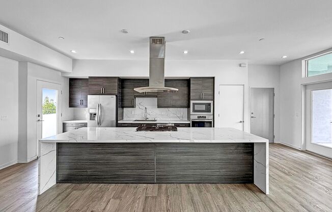 Modern 2BD/2BA Condo in North Park W/ High Ceilings, W/D & Reserved Garage Parking!