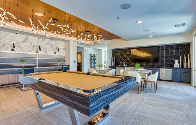 South Scottsdale Apartments - Lucent Scottsdale - Clubhouse with kitchen, dining tables and billiards table