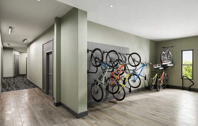 a row of bikes on a wall in a room at Link Apartments® CYKEL Apartments, Charlotte , NC 28208