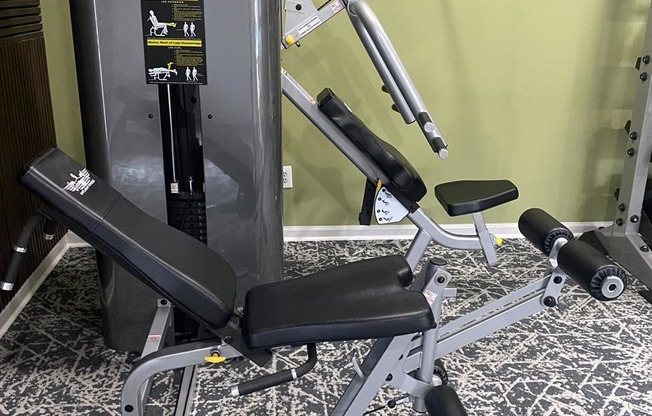 the gym has a lot of equipment in it