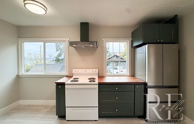 Charming Upper Unit with Modern Kitchen, Wraparound Layout & Walkable to PSNS