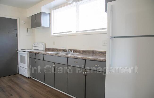 115 S 38 AVE