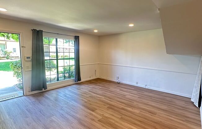 Spacious 3BR/2.5BA updated 2-story townhouse for rent with fenced patio, 2 parking spaces and more