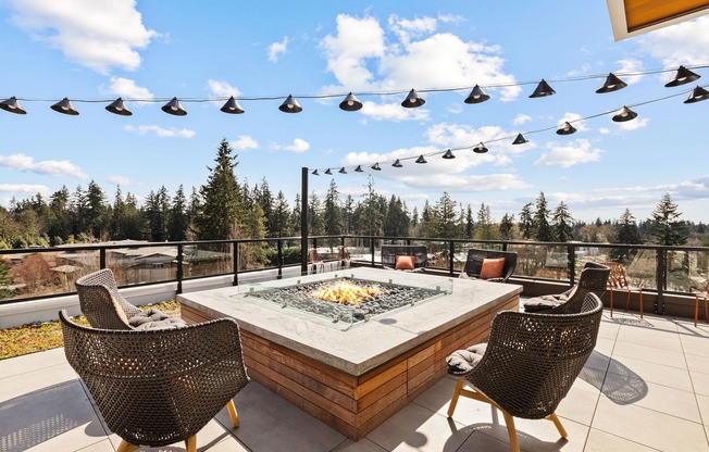 Rooftop deck with fire pits and seating areas