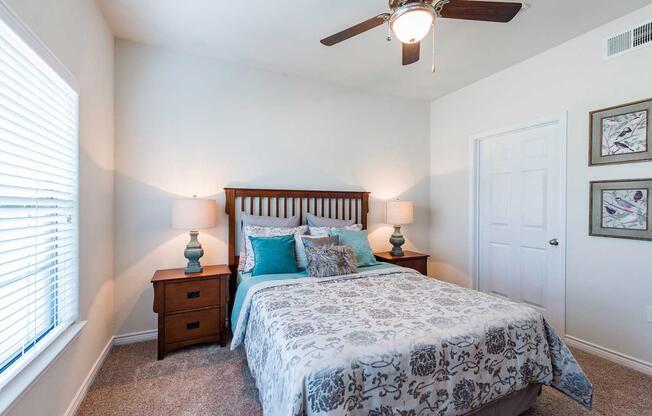 a bedroom with a bed in a room