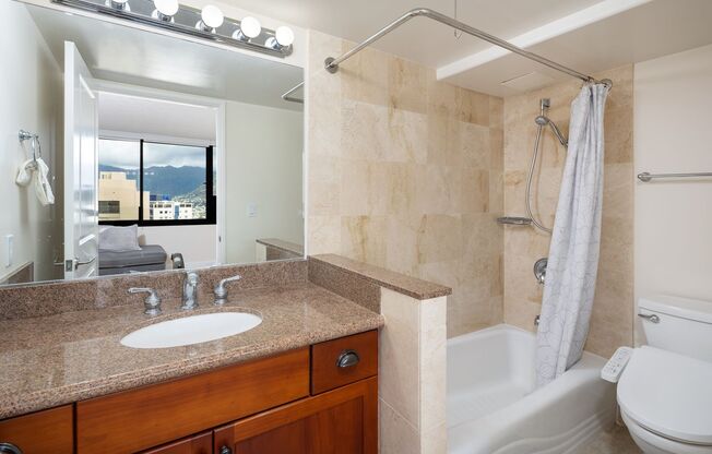 2 bedroom, 2 Bath Condo with BEAUTIFUL Mountain, Ocean, and Diamond Head Views.