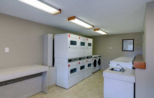 Community Laundry Suites At Pondside at Littleton Apartments.