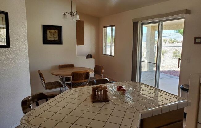 GREAT FURNISHED HOME WITH SIDE PARKING!