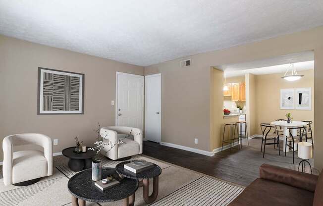 Spacious living room with natural light and comfortable seating in a pet-friendly home at Stratford Ridge Apartments in Marietta, GA.