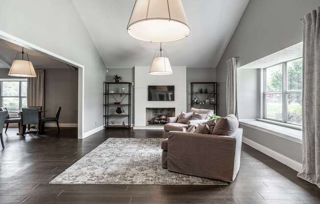 A living room with a fireplace and a couch