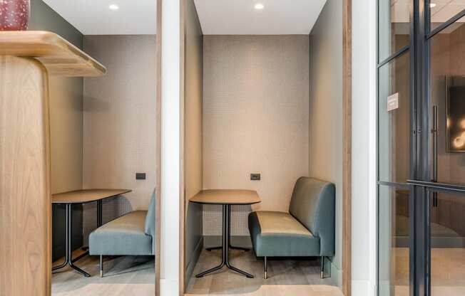 a waiting room with two chairs and a table at Cassidy on Canal, Chicago, IL, 60654