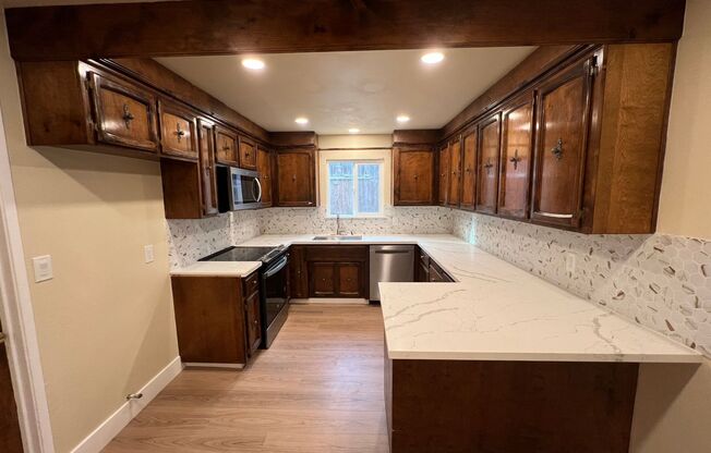 Gorgeous updated home with large side yard!
