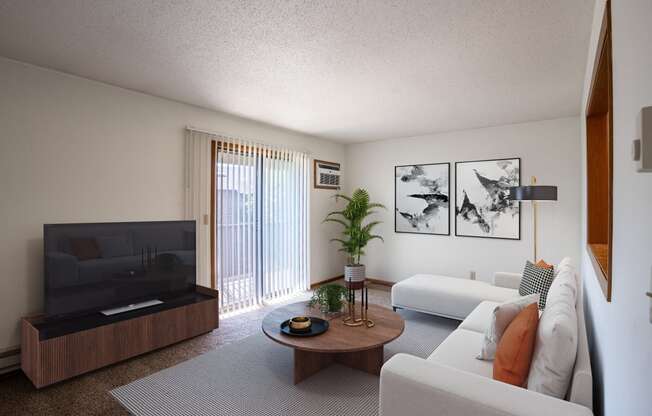 a living room with white furniture and a television. Fargo, ND Southview Village Apartments