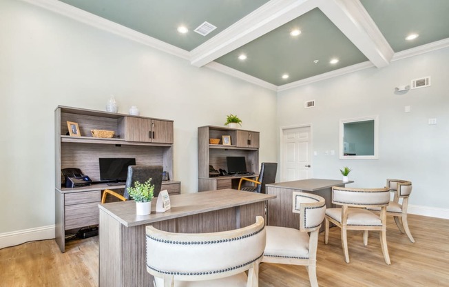 a living room with a desk and chairs at Reserve at Temple Terrace, Temple Terrace, 33637