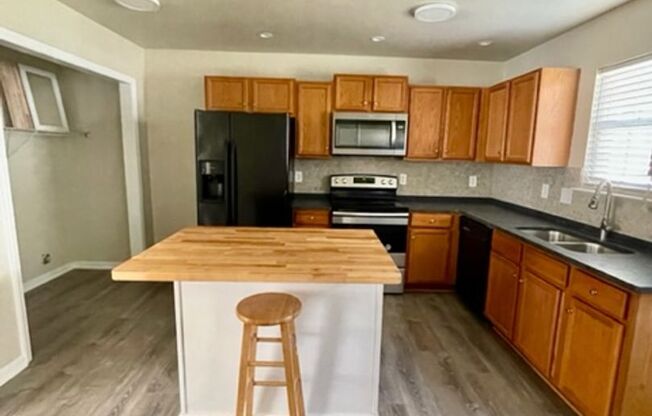 Must see this 4 bedroom 2.5 bath townhouse with 1 car garage . Close to Freedom Dr and Brookshire