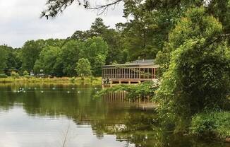 a house on the shore of a lake