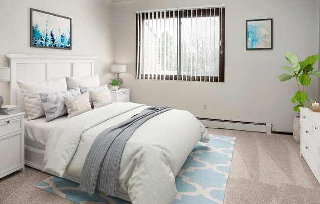 Comfortable Bedroom With Large Window at Aspenwood Apartments, Eagan, MN