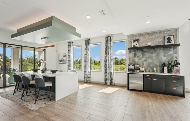 Resident clubhouse at The Crossing at Palm Aire with coffee station and bar seating