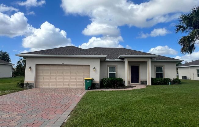 Cozy 3-Bedroom + Den with Modern Comforts & 2-Car Garage in Desirable Punta Gorda!