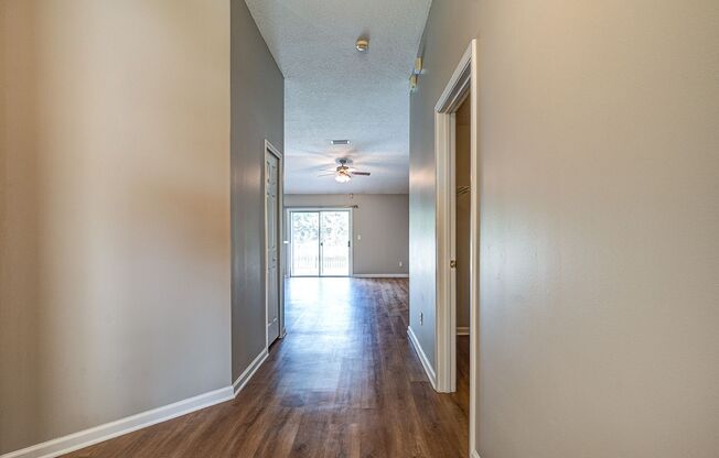 Freshly Updated 3 bedroom / 2 bath Gem with Pond Views, Luxe Flooring & Sleek Finishes in Spencer's Plantation!!!