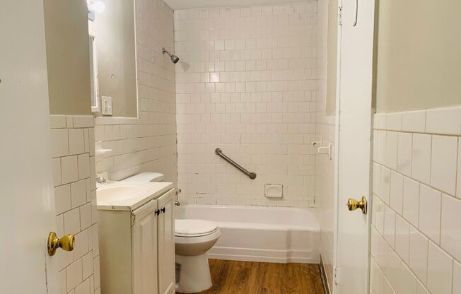 Beautiful hardwood flooring! 2 bed, 1 full bath plus office/possible 3rd bedroom, large kitchen, cooktop, newly renovated, parking for 2, deck, must see!