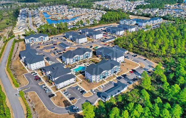 a large group of houses in a parking lot