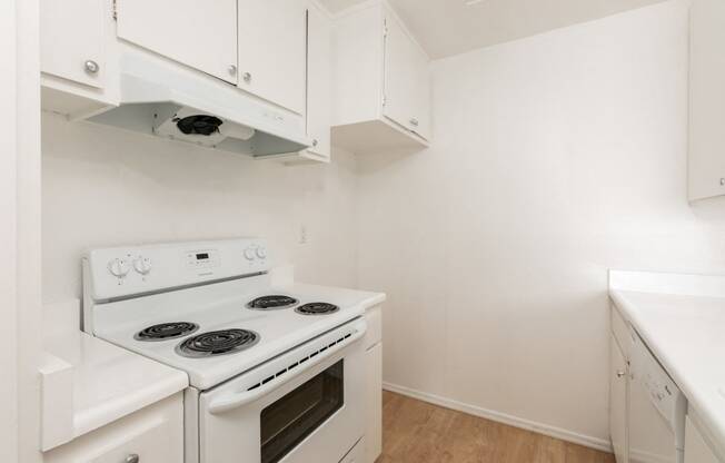 Kitchen with White Appliances and White Cabinets