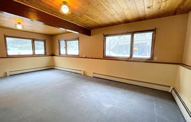 East Anchorage Four Bedroom Home with Bonus/Family Room, Fireplace, and Attached Garage