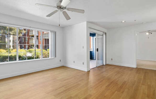 Living Room with Balcony and Hard Surface Flooring