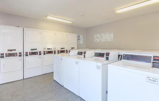 a large white refrigerator in a kitchen