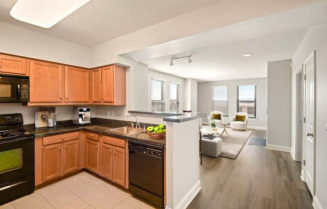 A kitchen with wooden cabinets