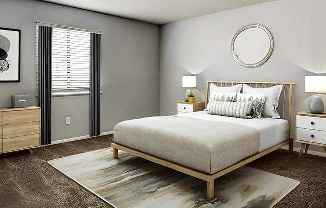 A bedroom with a bed, nightstands, and a rug.