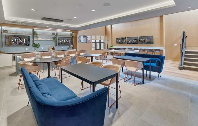 Modern dining and lounge area at The Mint Rahway with stylish seating, close to Rahway Train Station and Union County Performing Arts Center.