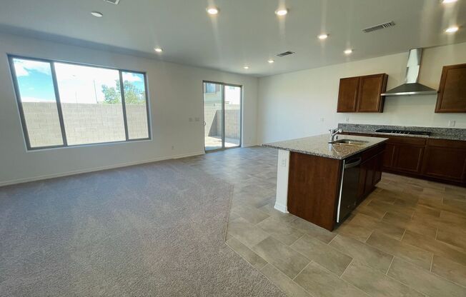 Brand new never lived in home in vibrant South West Las Vegas with open concept living room and kitchen with island and brand new appliances!