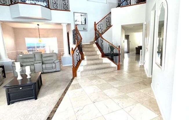 Elegant 2-Story Home with Over 4,000 Sq Ft, Pool, and Stunning Architectural Details