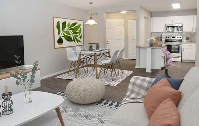 a living room and dining room with a table and chairs