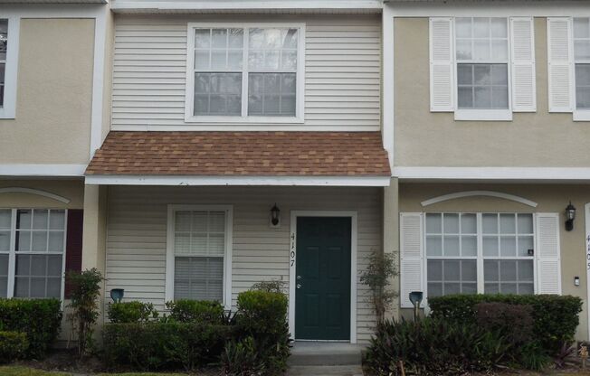 4107 Plantation Cove Dr. Quiet, cozy townhouse with view of the grounds.